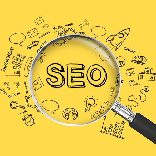 A magnifying glass highlights the word “SEO”, surrounded by hand-drawn icons and charts on a yellow background, representing search engine optimisation concepts as emphasised by a black-owned digital marketing agency in South Africa. - Proudly Developing